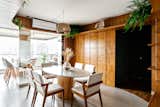 Compact apartment with open-plan spaces and strategic use of custom-made carpentry.