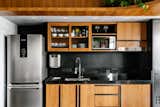 Compact apartment with open-plan spaces and strategic use of custom-made carpentry.