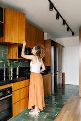 The Mirror in This Tiny Brazil Apartment Hides an Entire Work-From-Home Setup - Photo 5 of 12 - 