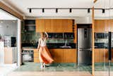 The Mirror in This Tiny Brazil Apartment Hides an Entire Work-From-Home Setup - Photo 4 of 12 - 