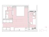 A floor plan of a compact apartment with the bedroom layout.