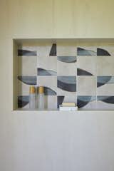 Captivating tile accent with flowing geometric patterns inspired by Japanese porcelain.