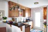 Kitchen  Photo 10 of 13 in This 680 Square-Foot Condo is Bursting with Culture and Color by Kathryn Fowler
