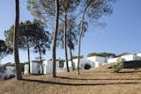 Jaime Prous Architects has created a complex of 23 single-family homes in Caldes de Malavella, Girona.