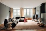 Living Room, Sofa, Wood Burning Fireplace, and Medium Hardwood Floor Toga Sofa   Photo 1 of 23 in Vondelpark Residence by Flare Department