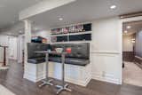 After photo:  bar height banquette added, new entry to movie room