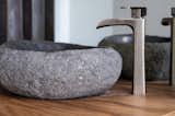 carved stone bathroom sink., Stone from local river bed