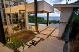 Side entry to terrace, pool, Bbq areas  Note exposed I Beams