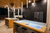 two center islands for cooking and food preparation. Hard Wood used on center islands and stair cases come from Osa Peninsula Costa Rica. Called Ojaca... considered very rare. Only cut with permits from the government