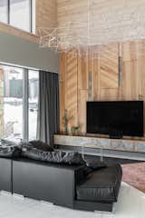 Living Room, Carpet Floor, Sofa, Ceiling Lighting, and Porcelain Tile Floor  Photo 2 of 38 in Stone&Wood by Алексей Silent-Architect