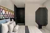 We used Grand Wicker pattern grill finished in Iridescence coating and a huge black curved headboard finished in suede for Sons Room, with edgy arched wall shelves and study finished in Ebony wood. Wardrobes were finished in ebony veneer and black mirror.
