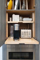 Recess pantry.  Maximum function - microwave, coffee bar, tray storage - minimal footprint