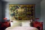 After: Spencer sourced the 1800s tapestry behind the bed on the ground floor from a vintage market in Paris.