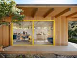A wall of clerestory windows brings afternoon light into the ceramics studio while large sliding glass doors can open it entirely to the garden. They were all custom-made by Blomberg, a company in Sacramento, and the project's biggest splurge.