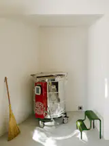 The kiln is set in a dedicated niche in the "dense, opaque potion at the center of the plan," says architect Max Obata.