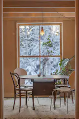 Vintage furnishings build the quaint dining room.