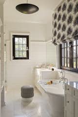 Bath Room, Marble Counter, Soaking Tub, Marble Floor, Drop In Sink, Ceiling Lighting, Ceramic Tile Wall, and Enclosed Shower Kiawah Island Residence by Vanessa Rome Interiors  Photo 9 of 27 in Kiawah Island Residence by Vanessa Rome Interiors by Veronica H. Speck