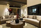 Located in the urban landscape of New Delhi, where luxury meets convenience, the residence, designed by the team of Archi Hives, unveils a skillfully crafted living space that redefines comfort and elegance while promising an unparalleled living experience.

The home boasts an impressive area of 14,154 sq. ft planned on five floors comprising the living spaces, dining areas, family areas, bedrooms and other functional areas. The design narrative of the interiors is an exemplification of contemporary aesthetics exuding luxury featuring high-quality finishes, premium materials and a neutral colour palette. Each space exudes sophistication with the precise use of semi-precious marble and stone curating a visually pleasing environment. A touch of opulence is added through exclusive lighting, fabric glass and stone inlays that create a luxurious tone while providing unique design aesthetics. This epitome of extravagance extends to the functional areas like the kitchen and bathrooms as they incorporate mirrors, opulent art pieces, elegant statement fixtures, paints, and mosaics that not only exude luxury but also add to the style and functionality of the space.

The residence is a statement of luxury, style and sophistication offering a fusion of elegant fixtures and furnishings. It stands as a confirmation to the belief that a well-planned transformation can turn even the most ordinary spaces into luxurious homes.


