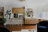 Dining Room, Dark Hardwood Floor, Stools, Chair, Shelves, Recessed Lighting, Bar, and Storage Bar and Kitchen Eatery with Retractable Divider   Photo 2 of 6 in The Mehta Residence by Milena Bica-Shibata