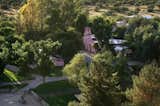 Aerial view of the main 8,000 square foot Spanish Hacienda with an authentic bell tower.