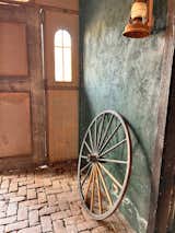 Wagon wheel in the barn at Rancho de los Cerros.