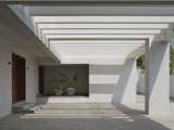 Driveway - Lights: Pierlite Star Point; Materials: Roman Cobble Stone, Textured Paint, Bush Hammered Silbata Stone, Mahogany Wood
