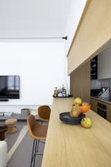 Living Room, Chair, Sofa, Bookcase, Wall Lighting, and Coffee Tables  Photo 13 of 21 in Canonica Apartment by Euga Design Studio