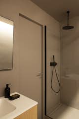 Bath Room, Concrete Floor, Two Piece Toilet, and Concrete Counter  Photo 2 of 21 in Canonica Apartment by Euga Design Studio