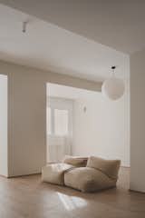 Living Room, Sofa, Pendant Lighting, Medium Hardwood Floor, and Ceiling Lighting Living Room  Photo 1 of 15 in ML21 by Maximale