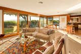 Open plan, living room, dining, and kitchen looking west