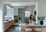 12. Open, simple and sophisticated Kitchen. The top half of the kitchen is kept within the mild colour palette to allow a sense of lightness.