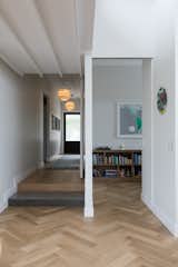 Hallway, Light Hardwood Floor, and Rug Floor Office  Photo 6 of 13 in Villa Sandringham by KKID