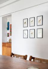 Enhance your dining hall design with a stylish side table next to the wall. This functional and decorative piece adds convenience and elegance to your space. With its sleek design and ample surface area, it's perfect for displaying decor items, holding tableware, or serving as a practical storage solution. ​