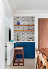Create a seamless connection between your kitchen and dining hall with a well-designed mid partition. Not only does it enhance the aesthetics of your space with its tasteful decor, but it also serves a functional purpose by facilitating easy food delivery from the kitchen to the dining area. Enjoy the convenience and added charm of this innovative dining hall design element.​