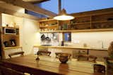 Kitchen, White Cabinet, Pendant Lighting, Drop In Sink, Wood Counter, and Light Hardwood Floor Kitchen clerestory  Photo 17 of 18 in House Russel by KLG Architects