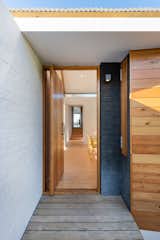 Doors, Exterior, Wood, and Swing Door Type  Photo 12 of 21 in House Swanepoel by KLG Architects