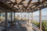 Even the Loft-Level Netting Has Water Views at This Chilean Beach House - Photo 23 of 26 -