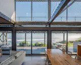 Even the Loft-Level Netting Has Water Views at This Chilean Beach House - Photo 15 of 26 -