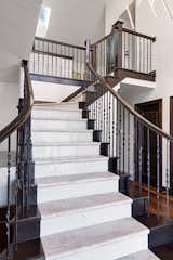 Staircase, Wood Railing, Wood Tread, and Metal Railing  Photo 8 of 14 in Contemporary Home in the Mountains by Lisman Studio