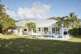 The pool area is for family fun with a tV area on the adjacent patio and an entertainment area for cocktail parties.