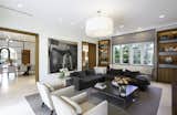 Modern family room featuring black and white screen print on the wall by David Noonan.  Photo 8 of 11 in A Fusion of Historic Into Modern by Andrea Halley-Wright