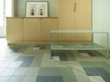A light-coloured phenolic birch plywood panel is used for the doors on all the items of furniture.