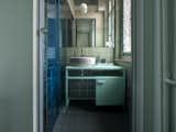 A specially designed practical sink unit was added, with square mesh expanded metal doors. 
