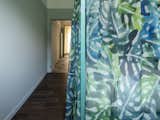 The material is perforated and printed with ‘multi-colour foliage’ patterns of ‘Monstera Deliciosa’.