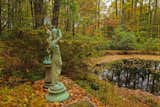 Garden Statues of the former property owner remain to provide a unique sense of mountain garden elegance (photo credit Aerial Photo Pros)