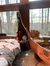 Living Room, End Tables, Chair, and Shelves Each Guest at The Barn at Edenwood is provided a growler of our homebrewed beer w/ additional sunset winter view (photo credit The Hive Drive)  Photo 15 of 35 in The Barn at Edenwood NC by Catherine Morris