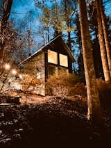 Exterior, Wood Siding Material, Tiny Home Building Type, and Metal Roof Material Winter Glow of the loft at The Barn at Edenwood (photo credit The Hive Drive)  Photo 18 of 35 in The Barn at Edenwood NC by Catherine Morris