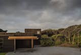 Exterior, House Building Type, Wood Siding Material, Flat RoofLine, and Metal Roof Material Front entrance  Photo 2 of 10 in Peka Peka House II by Herriot Melhuish O'Neill Architects
