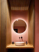 Warm colors in the guest bathroom.
