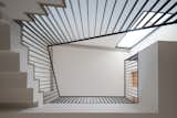 Staircase, Wood Tread, and Metal Railing  Photo 10 of 11 in Minimal Minijai House by P Chaivichian
